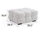 Canapé-pouf capitonné en tissu bouclé blanc moelleux