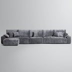 Le canapé et le pouf beiges Empress