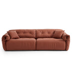 Canapé en cuir véritable brun rougeâtre capitonné beurre