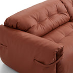 Canapé en cuir véritable brun rougeâtre capitonné beurre