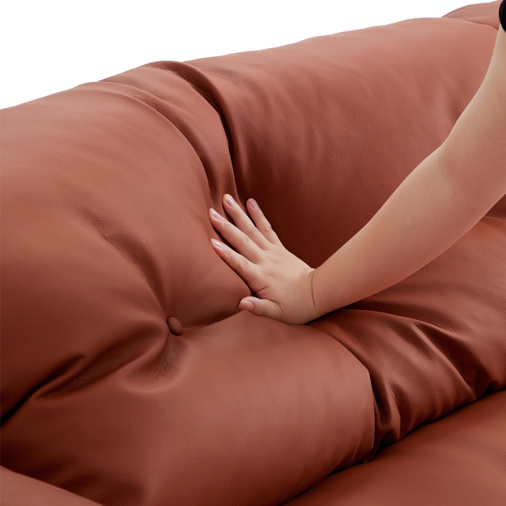 Canapé en cuir véritable brun rougeâtre capitonné beurre