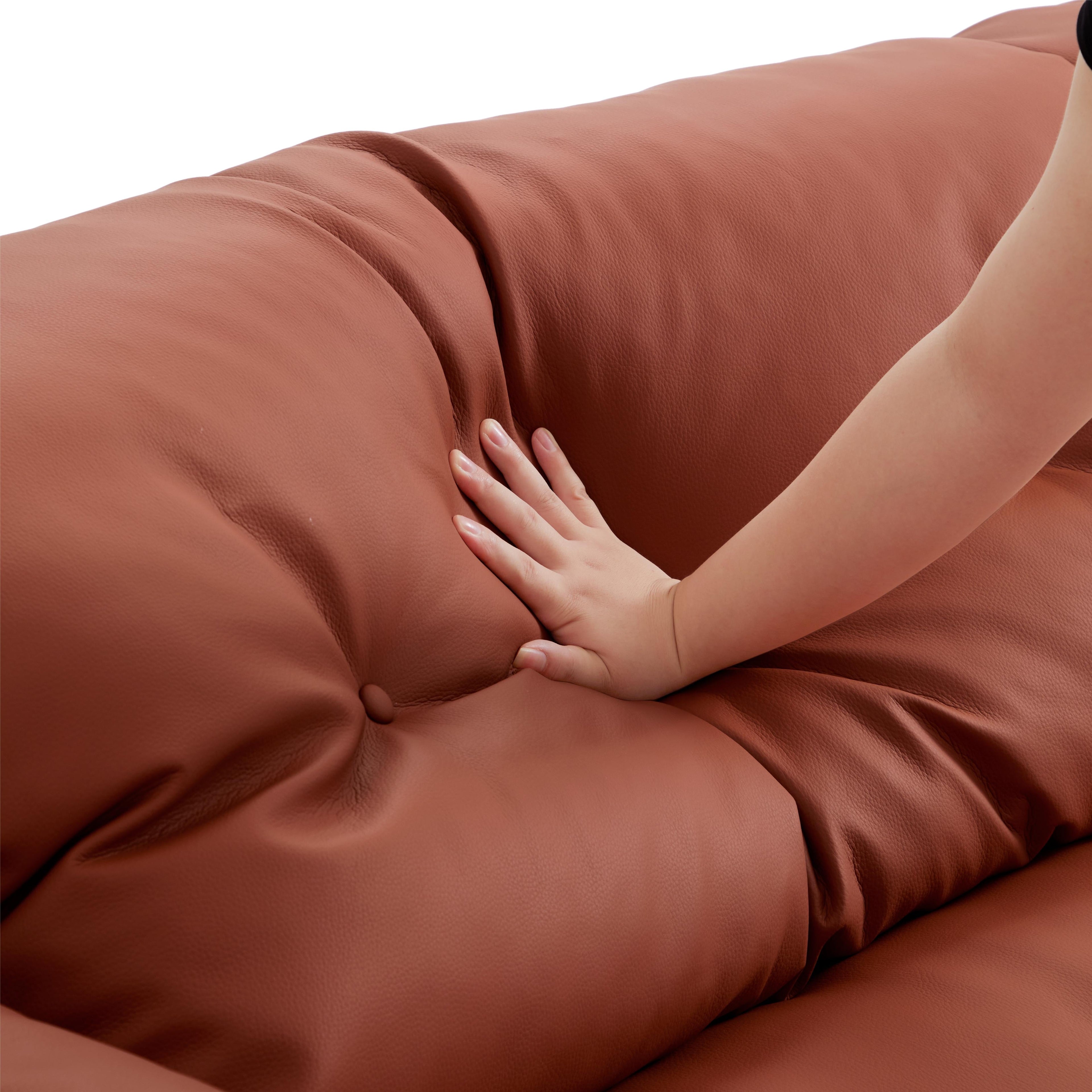 Canapé en cuir véritable brun rougeâtre capitonné beurre