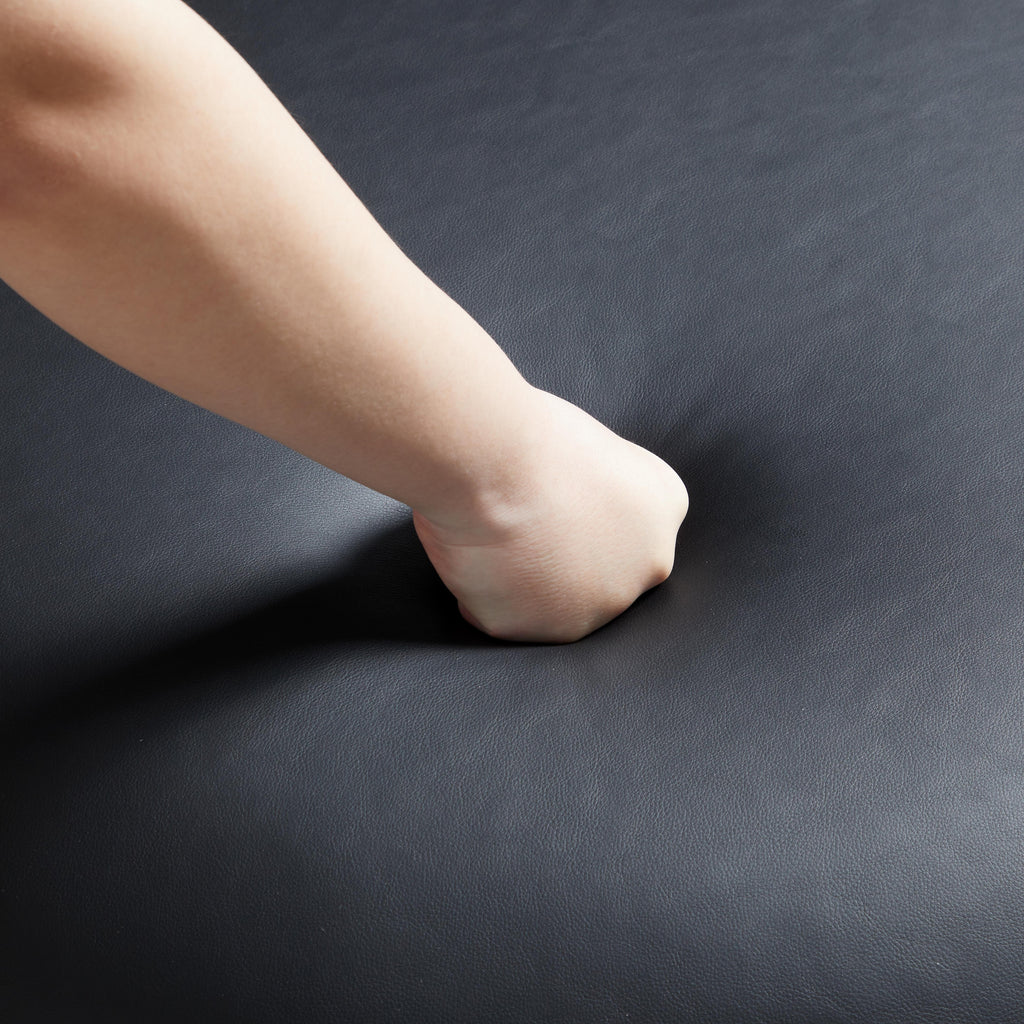 Pouf rond en cuir noir Monolith