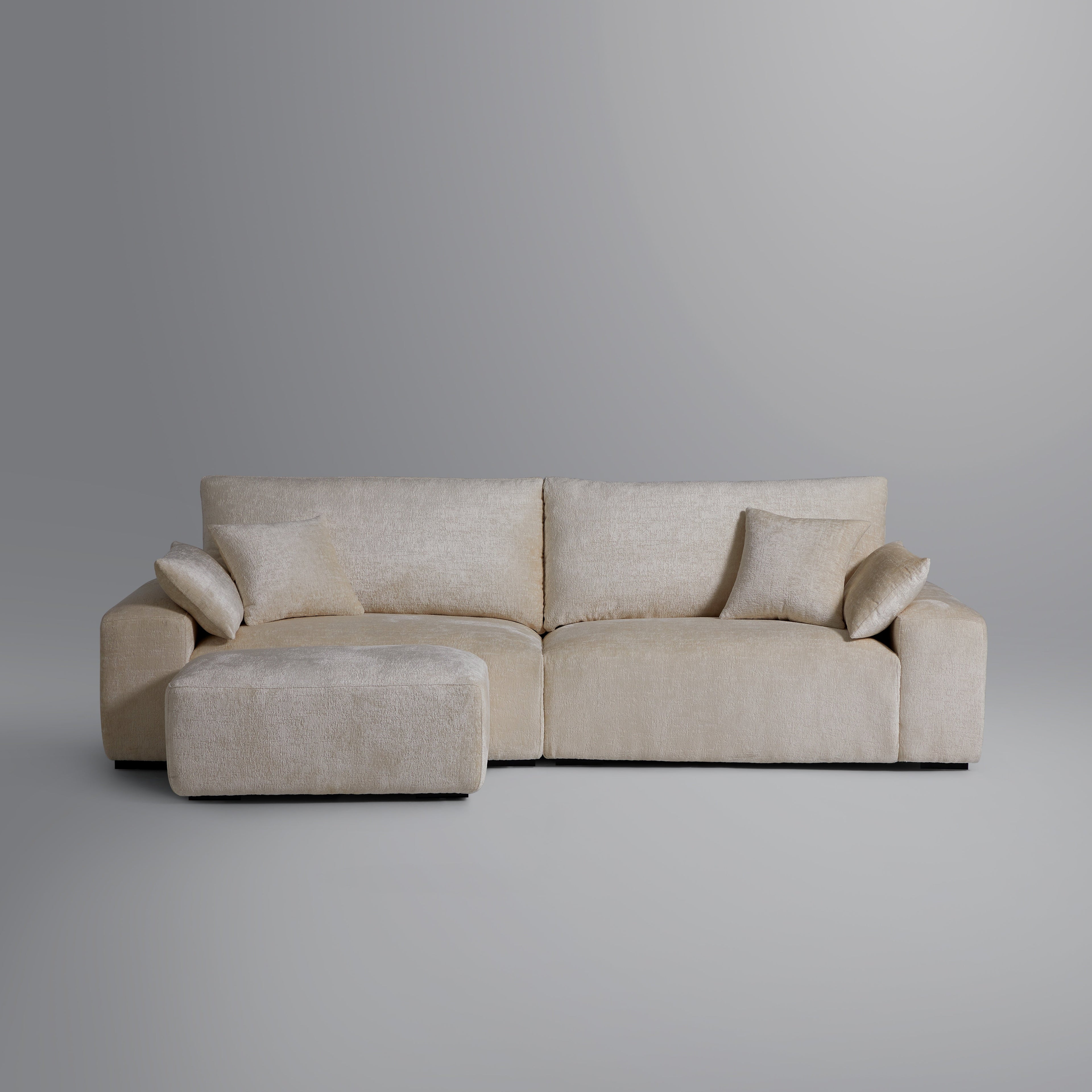 Le canapé et le pouf beiges Empress