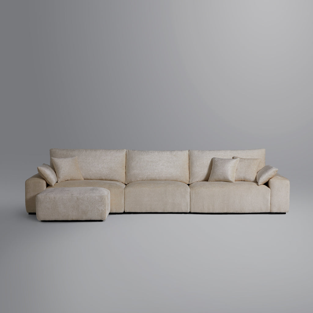 Le canapé et le pouf beiges Empress