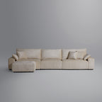 Le canapé et le pouf beiges Empress