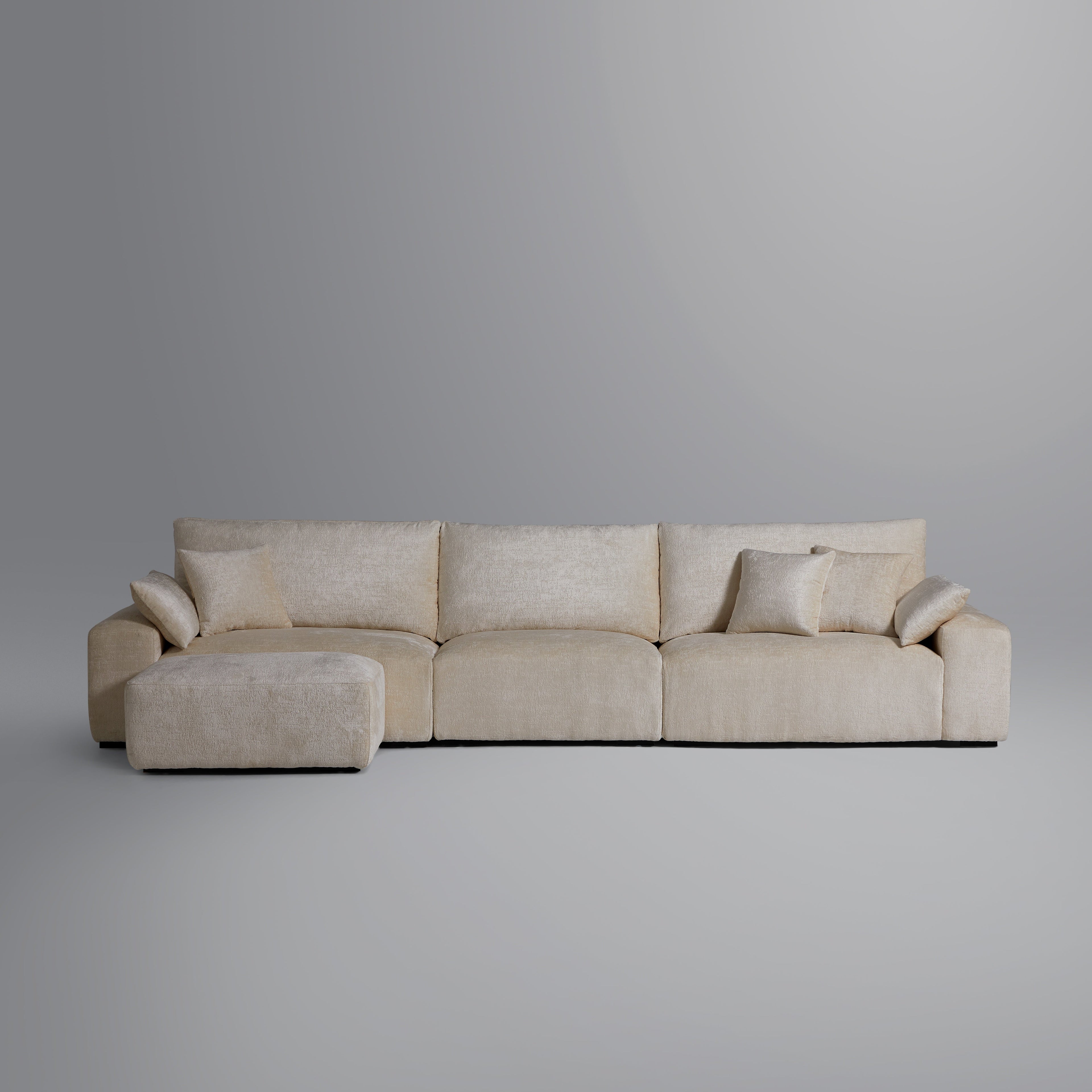 Le canapé et le pouf beiges Empress