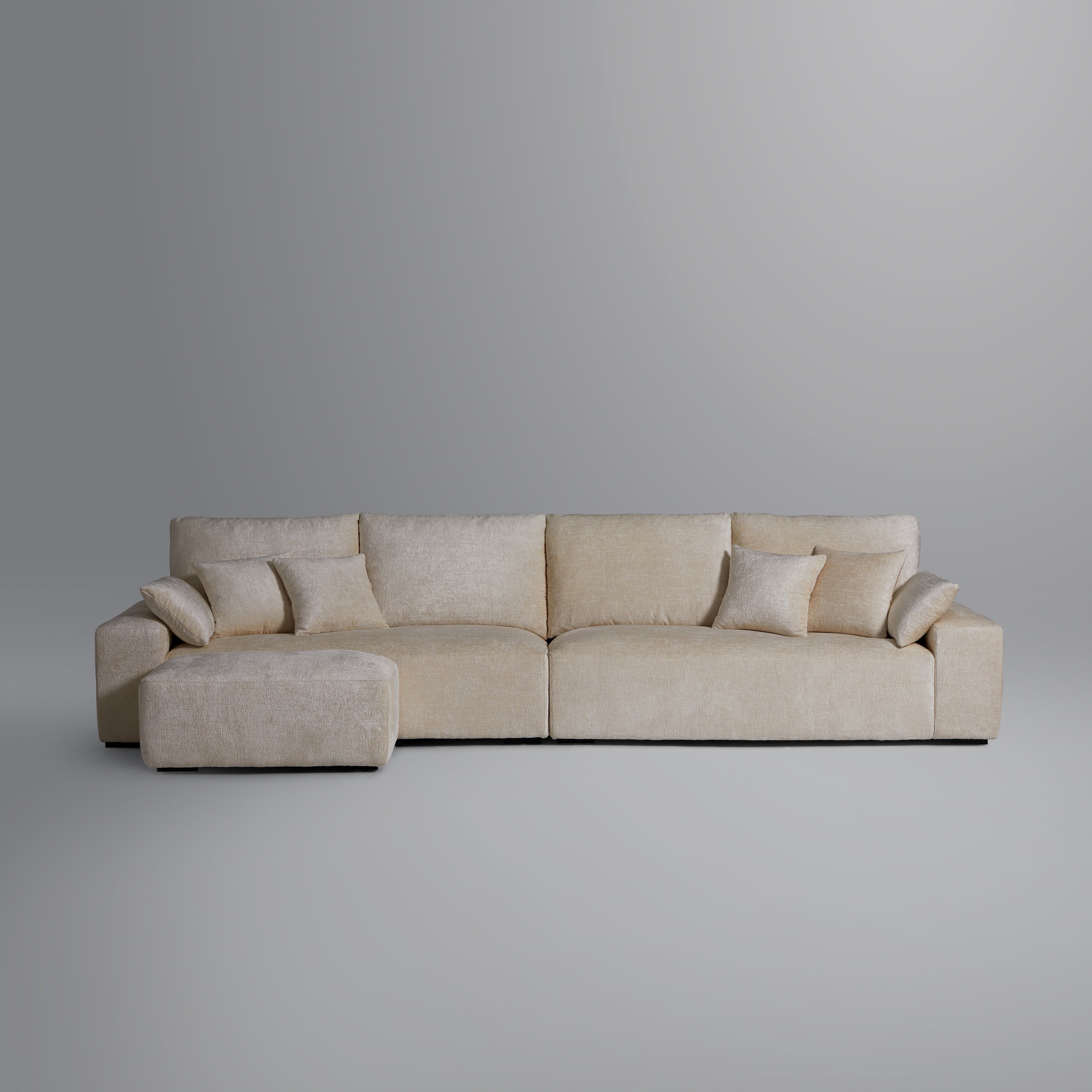 Le canapé et le pouf beiges Empress