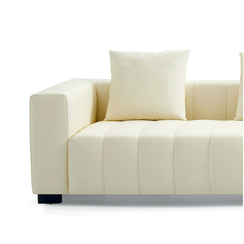 Canapé en cuir beige piano avec table basse