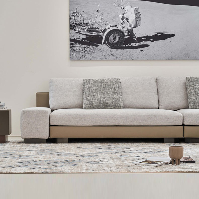 Canapé d'angle incurvé en tissu gris Arles