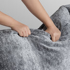 Le canapé et le pouf gris Empress