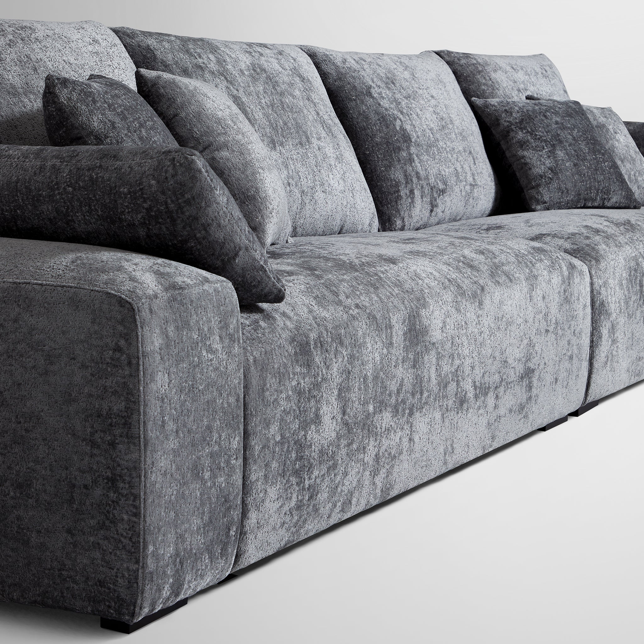 Le canapé et le pouf gris Empress