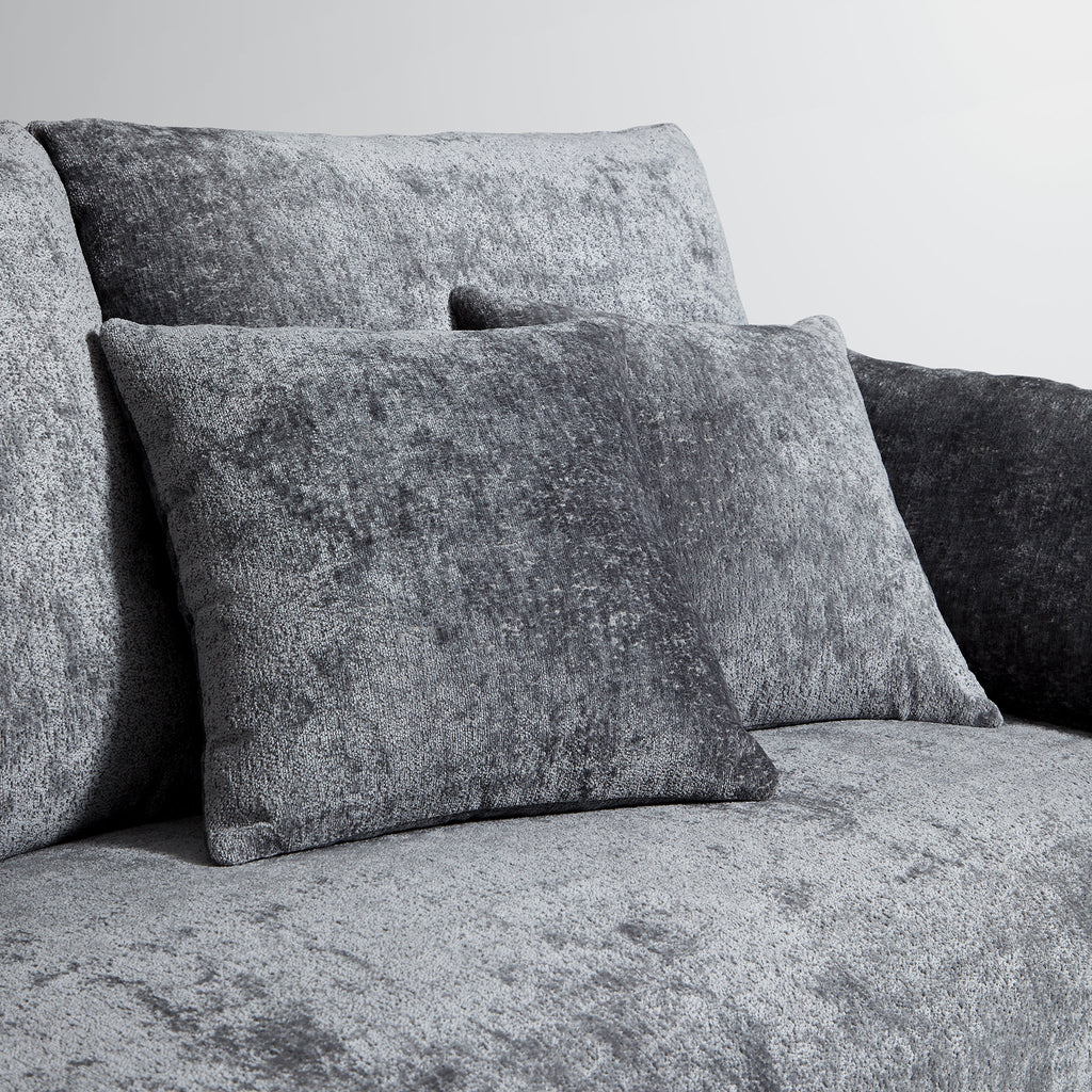 Le canapé et le pouf beiges Empress