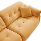 Canapé capitonné jaune beurre