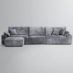 Le canapé et le pouf gris Empress