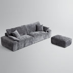 Le canapé et le pouf gris Empress