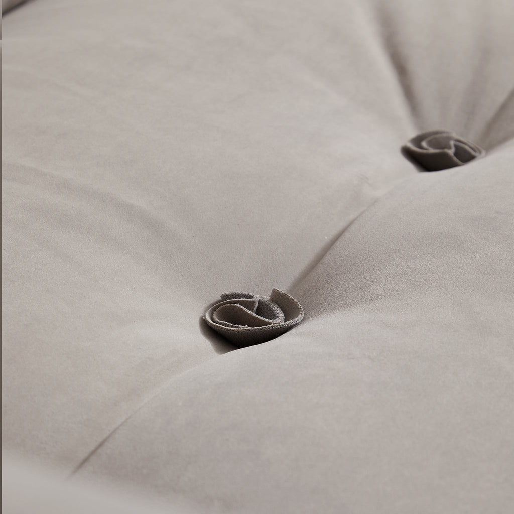 Canapé capitonné jaune beurre