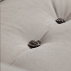 Canapé capitonné jaune beurre