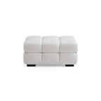 Canapé-pouf capitonné en tissu bouclé blanc moelleux