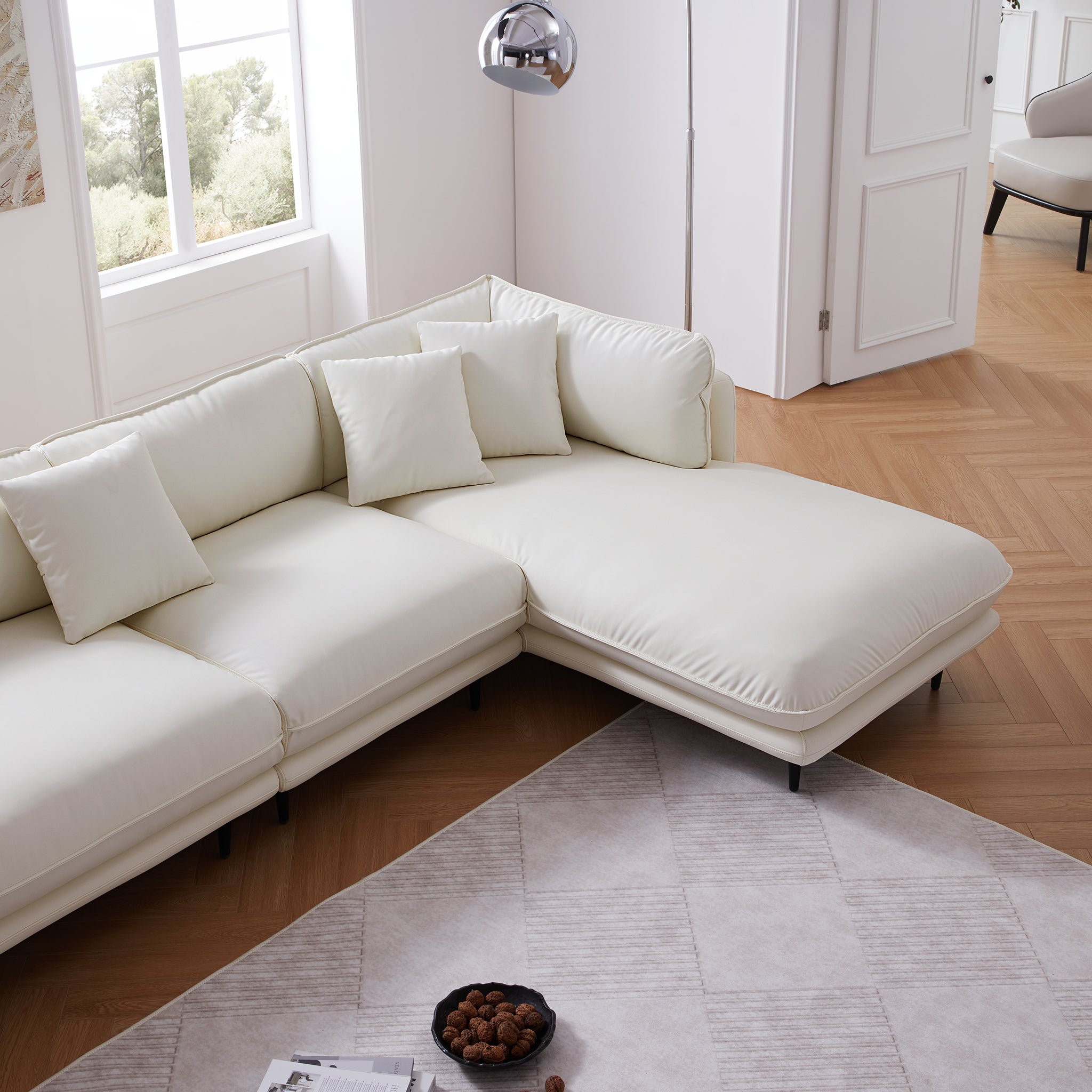 Canapé d'angle en cuir blanc vanille