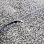 Fauteuil pivotant Luna en tissu bouclé gris clair