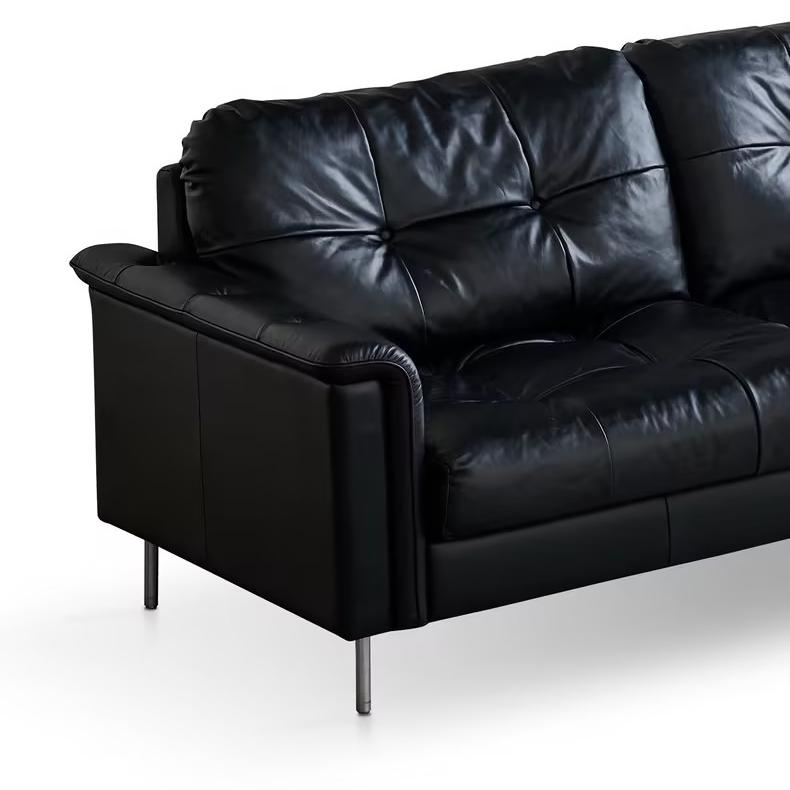 Canapé baroque capitonné en cuir noir 