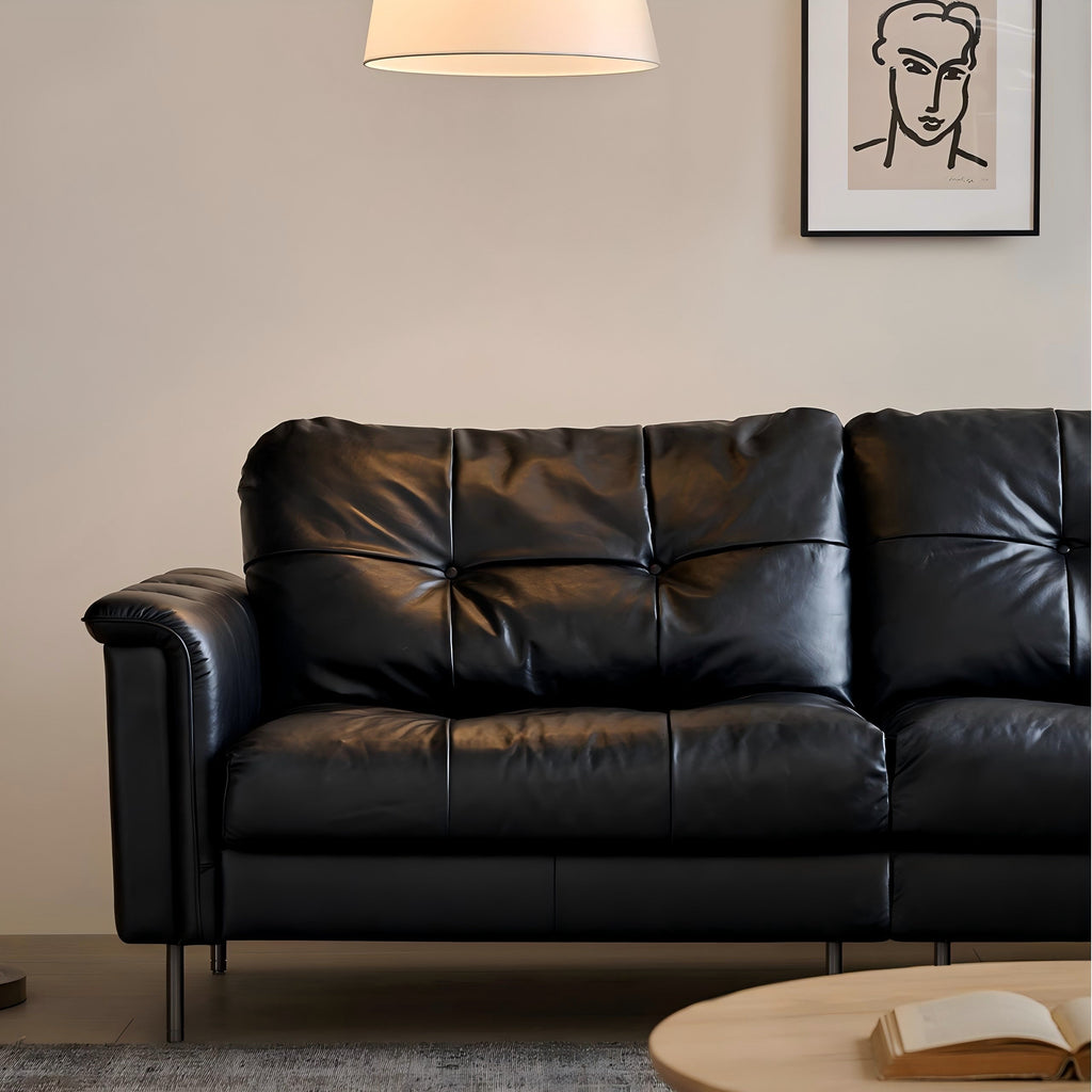 Canapé baroque capitonné en cuir noir 