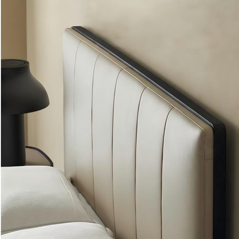 Lit en cuir à bords muffins