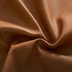 Lit en cuir cannelle