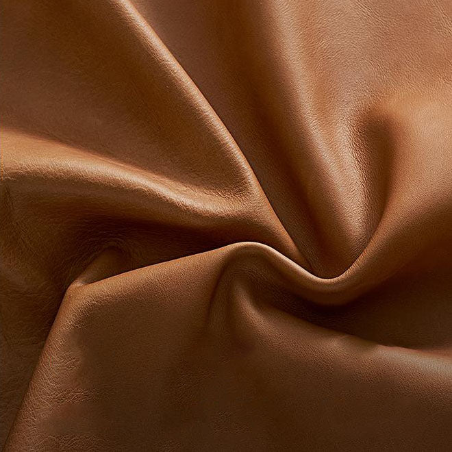 Lit en cuir cannelle