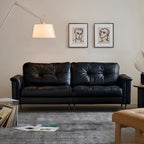 Canapé baroque capitonné en cuir noir 