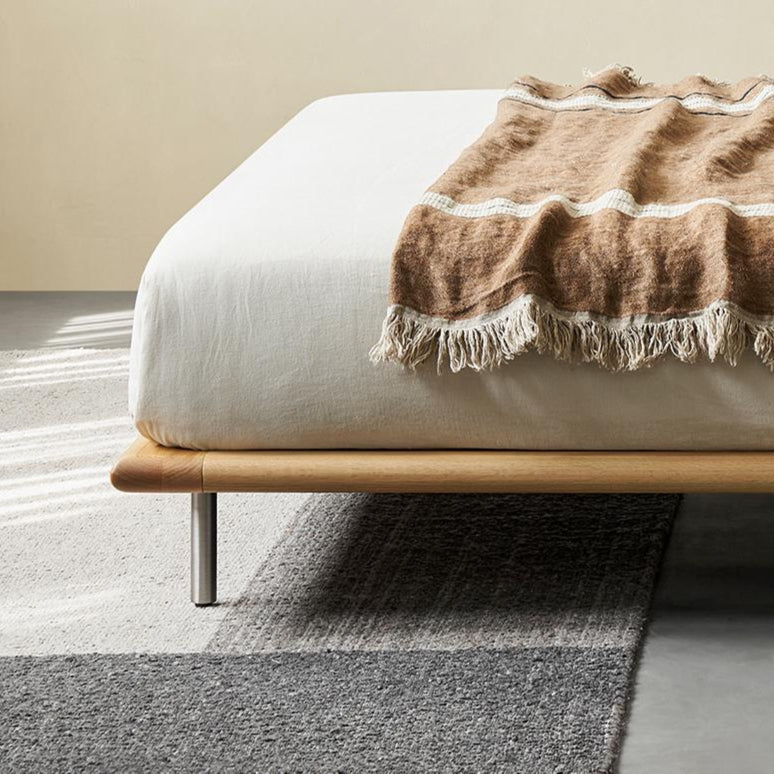 Lit en cuir couleur brique caramel