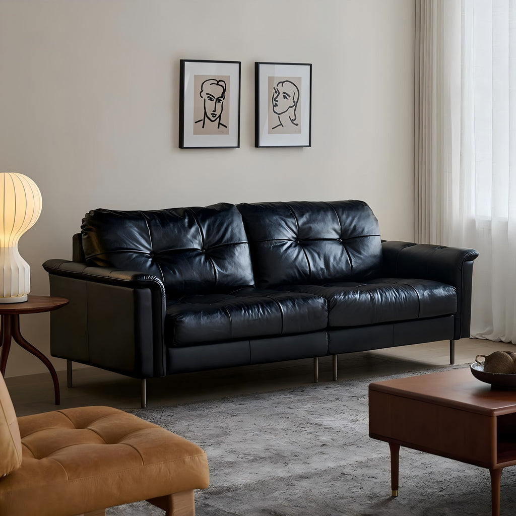 Canapé baroque capitonné en cuir noir 