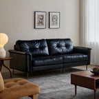 Canapé baroque capitonné en cuir noir 