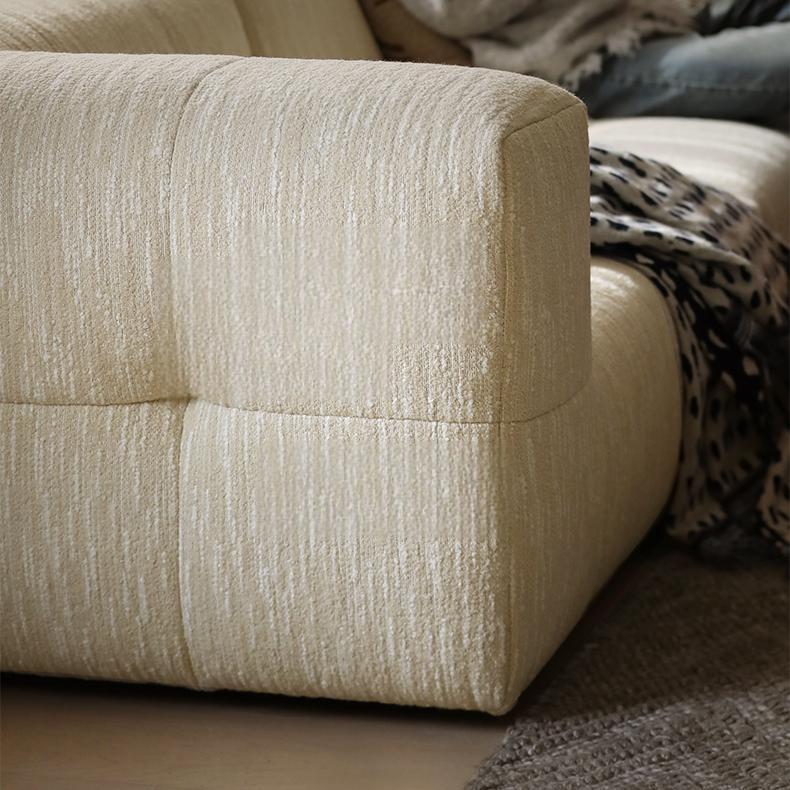 Canapé sectionnel incurvé crème amande