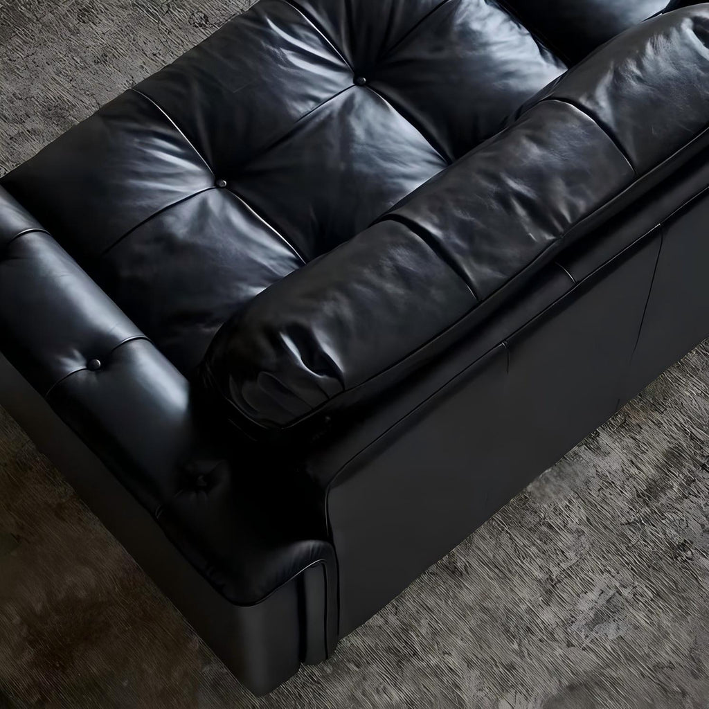 Canapé baroque capitonné en cuir noir 