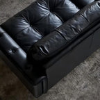 Canapé baroque capitonné en cuir noir 