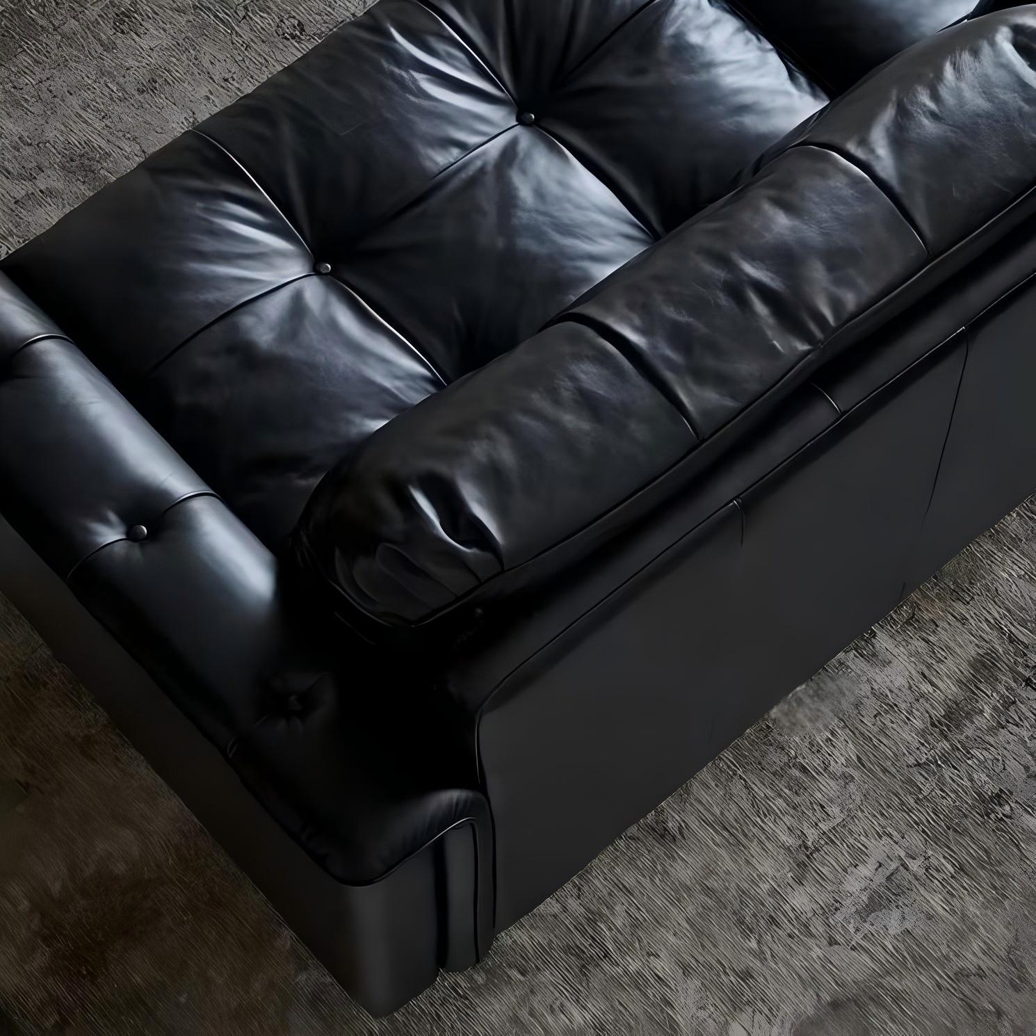 Canapé baroque capitonné en cuir noir 